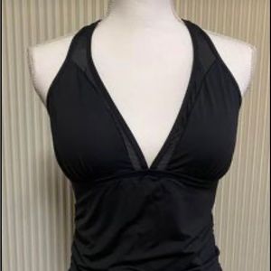 New with tags Tommy Bahama two piece tummy control swim suit.